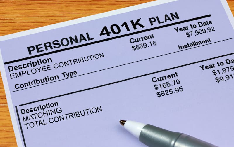 A person reviewing their most recent 401k plan contribution record.