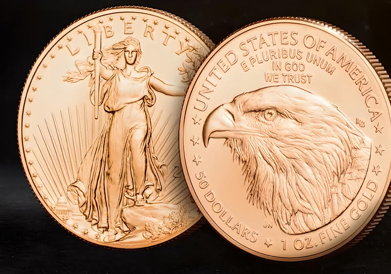 A close-up of a gold coin with an eagle on it, representing precious metal investments