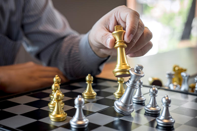 A chess game, representing strategic moves for gold investing